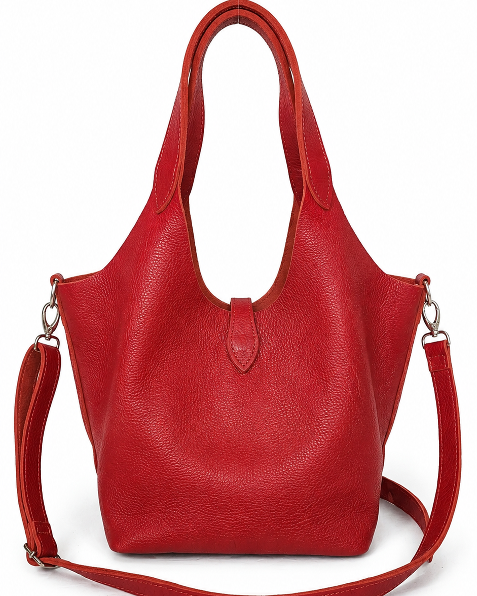 A red pebbled leather hobo-style shoulder bag with dual top handles and a detachable shoulder strap