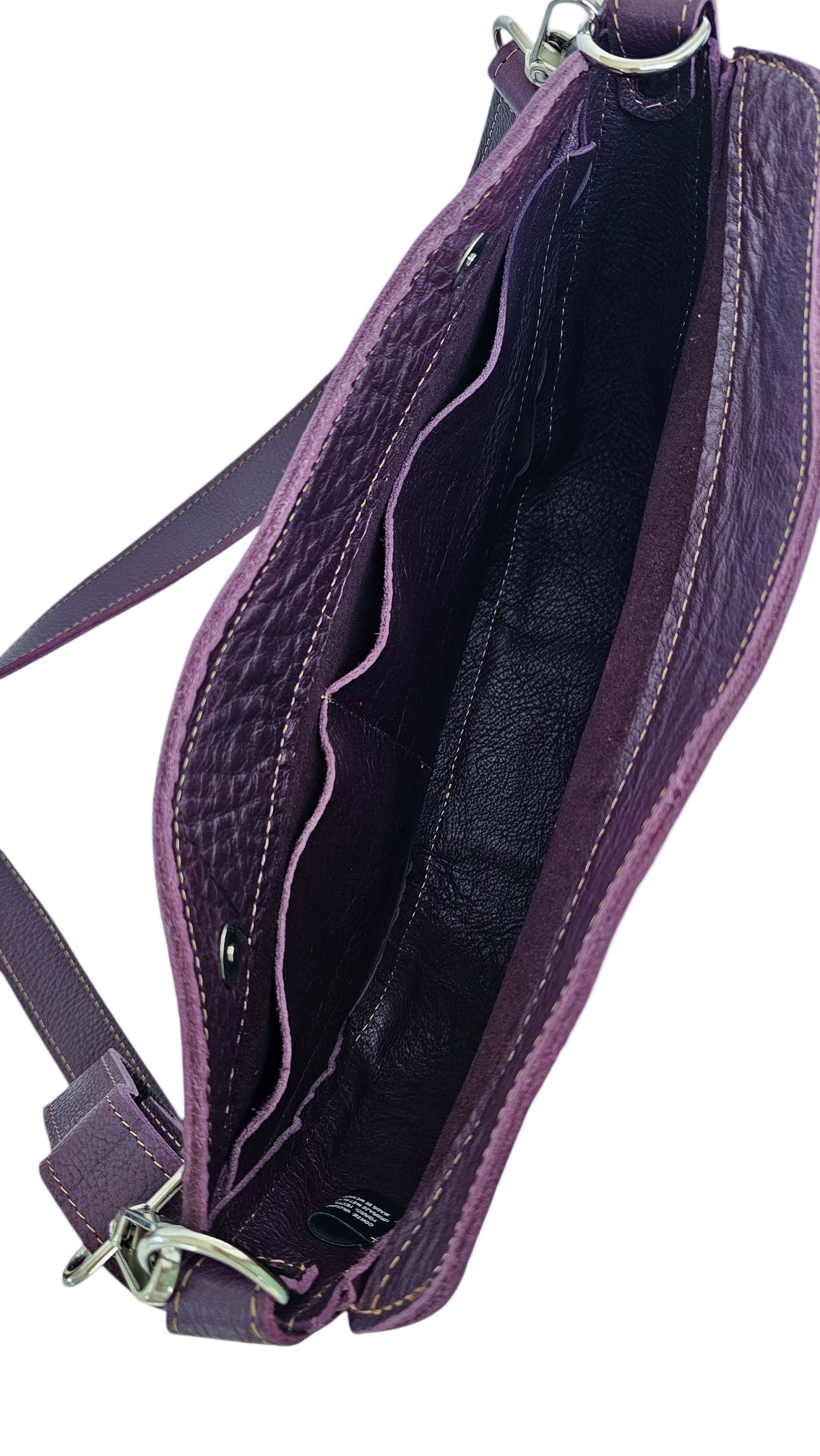Luna crossbody bag interior showing leather lining and two slip pocket