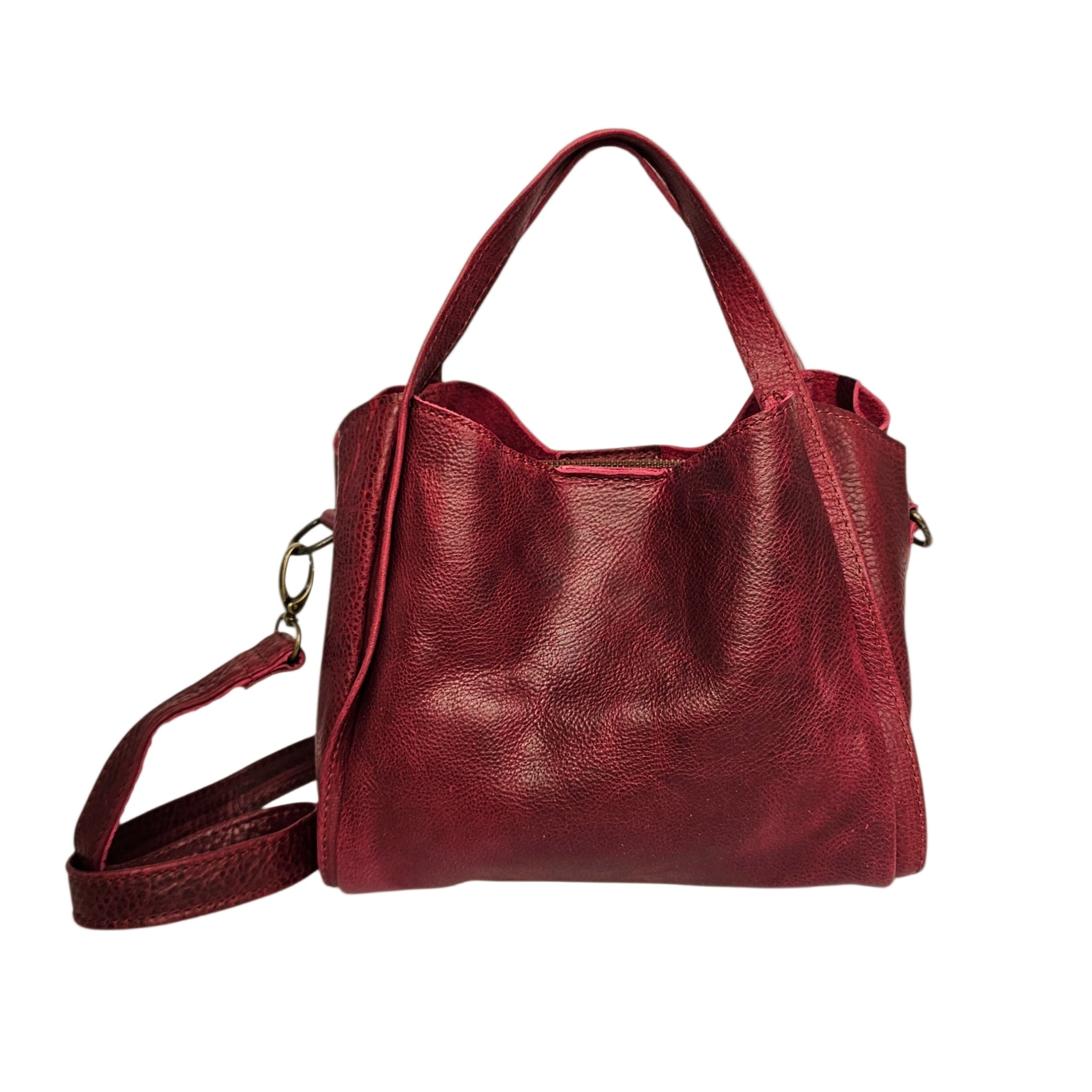 Elegant MBH leather crossbody bag with handles and strap in red color
