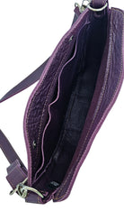 Luna crossbody bag interior showing leather lining and two slip pocket