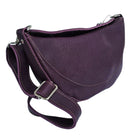 Luna full-grain leather crossbody bag on white background with adjustable strap.