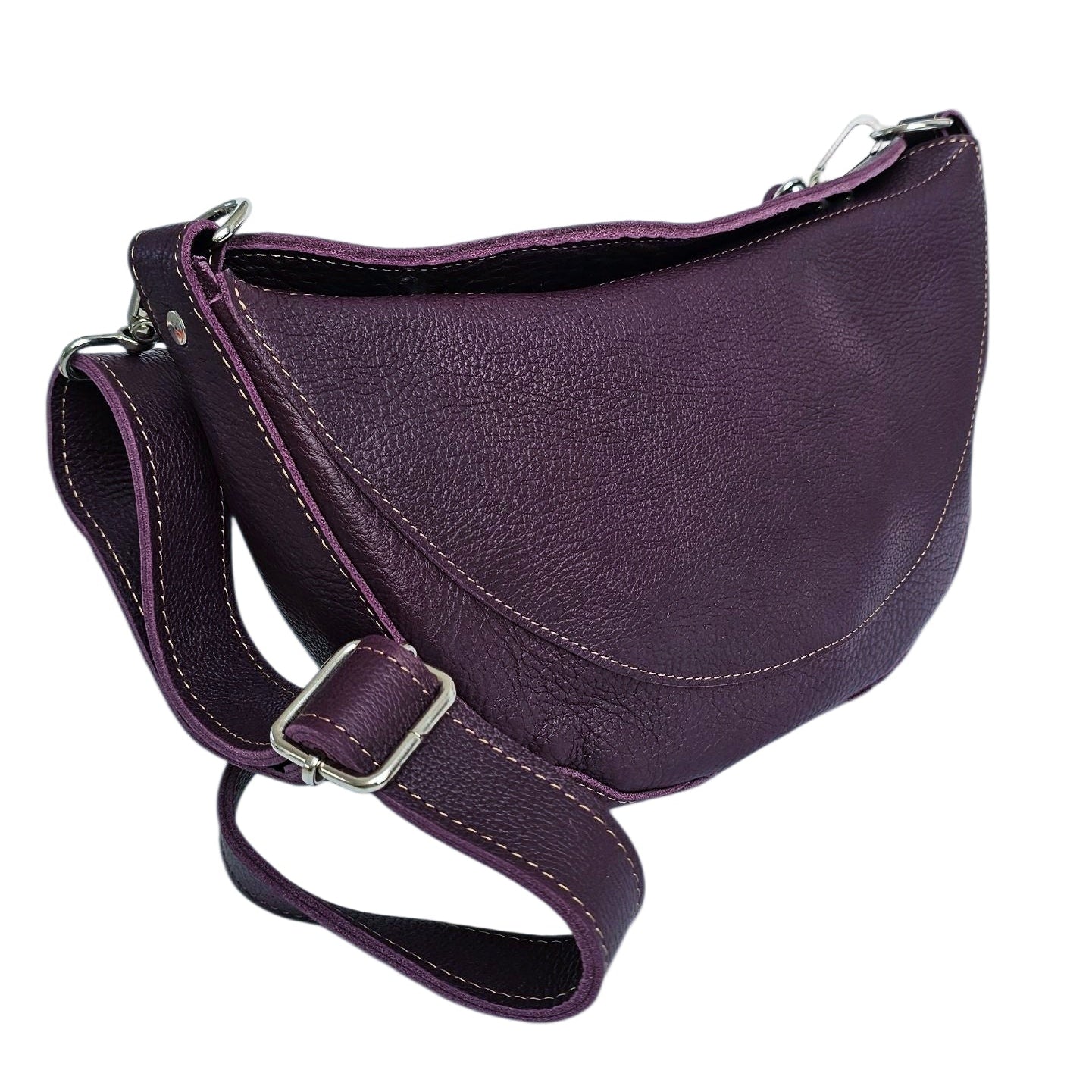 Luna full-grain leather crossbody bag on white background with adjustable strap.