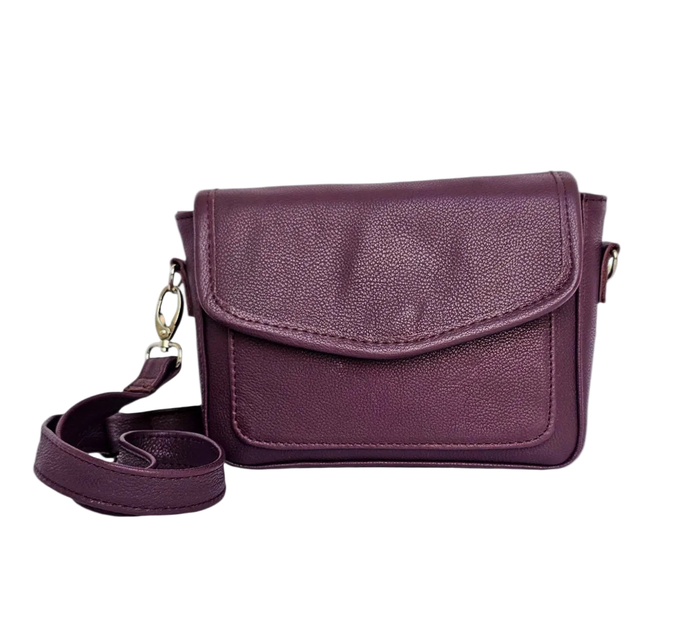 Purple leather crossbody bag on a white background