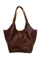 A brown leather shoulder tote bag with crossbody strap