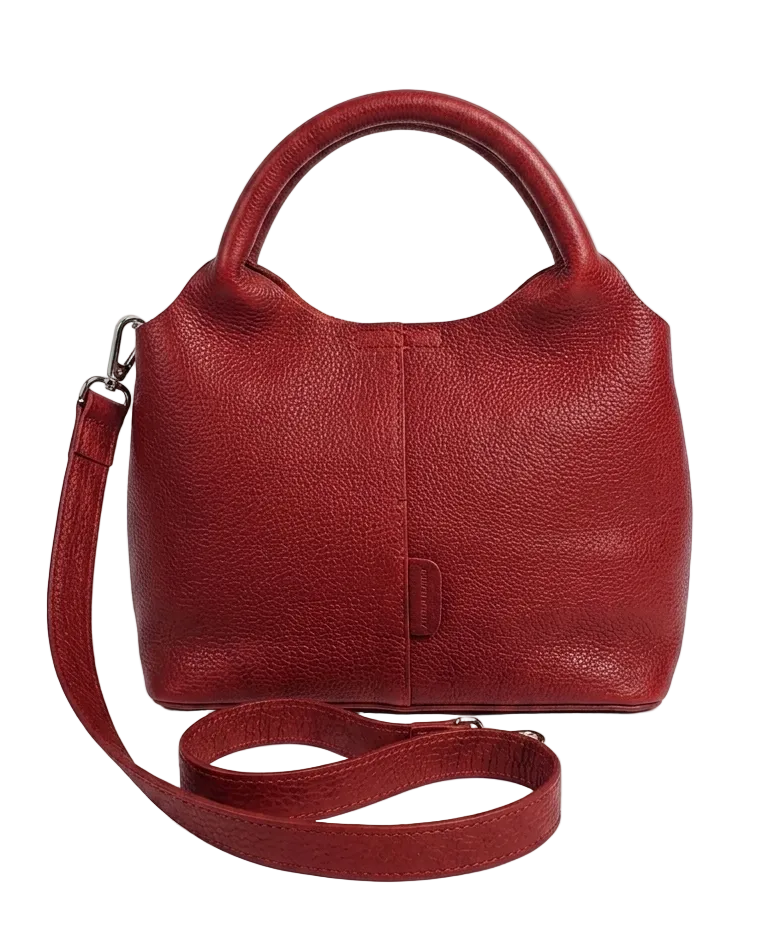 Red leather crossbody bag with a strap on a white background